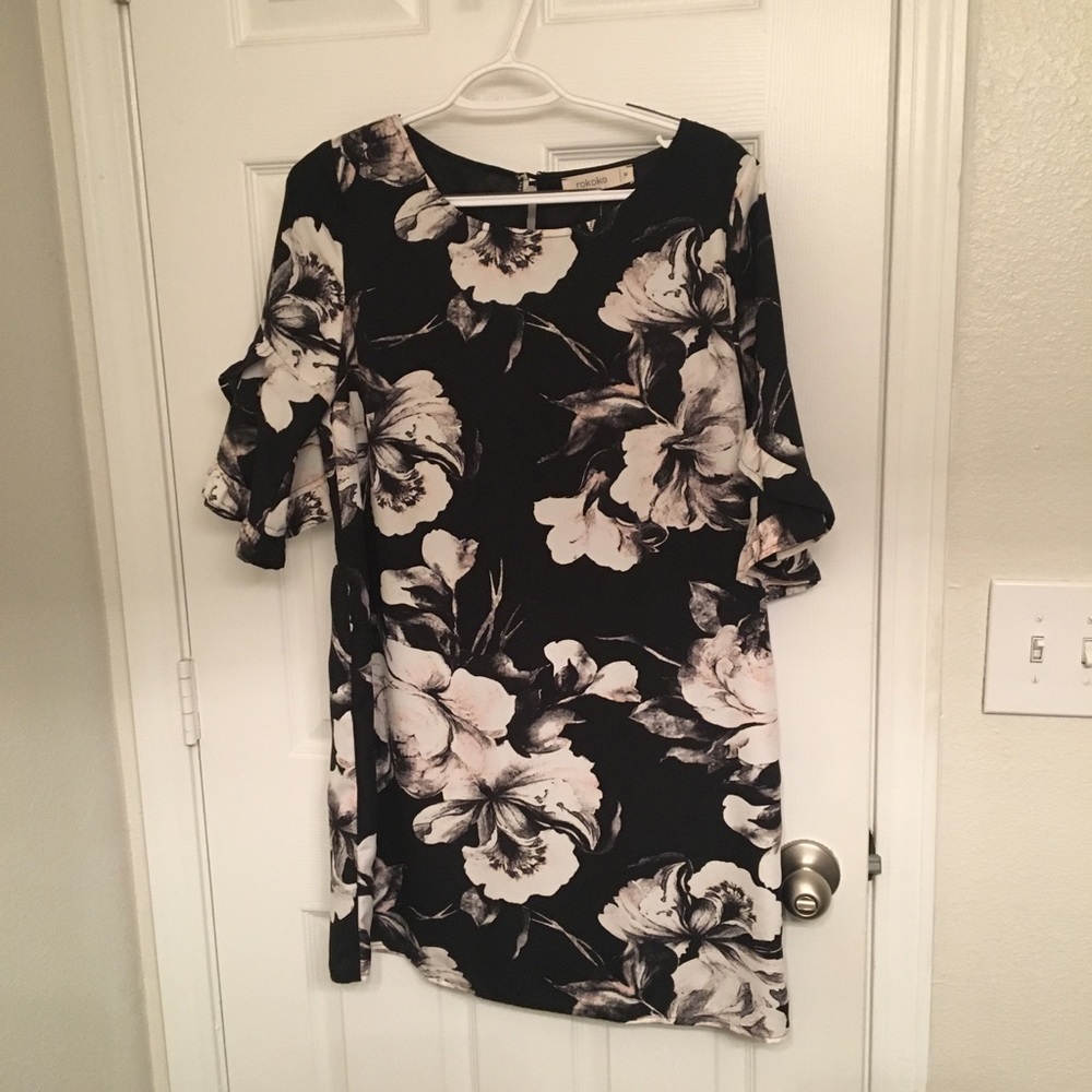 Black dress with white and pale pink floral print